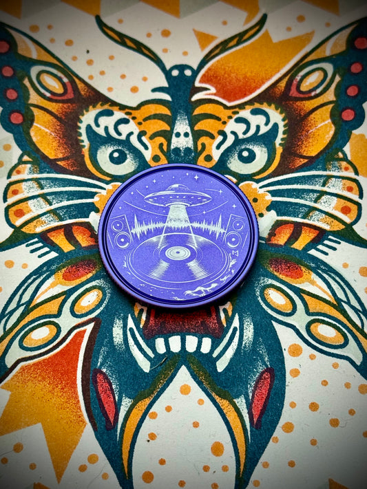 The sound in the universe- Anodized purple.